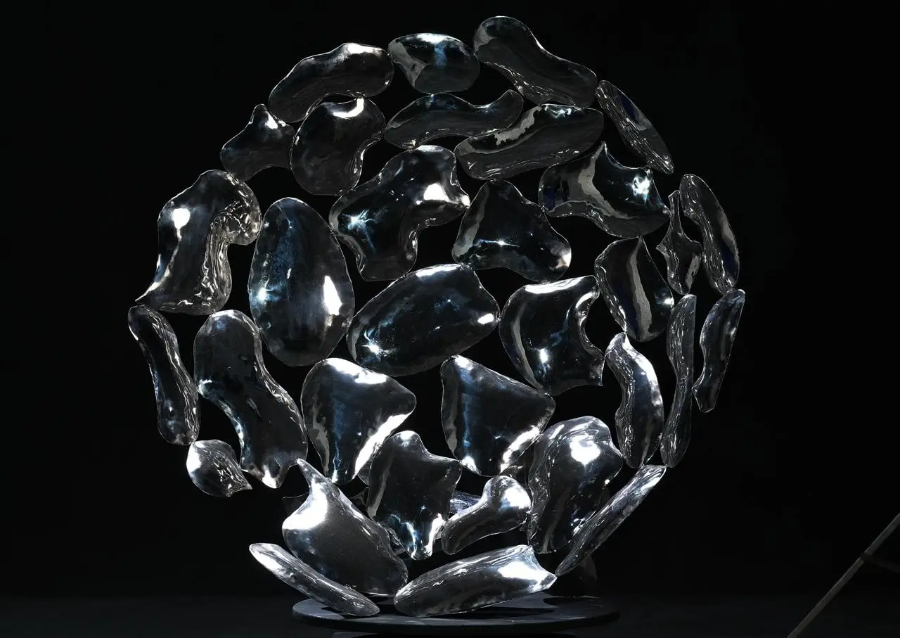 Polished stainless-steel cluster sphere sculpture
