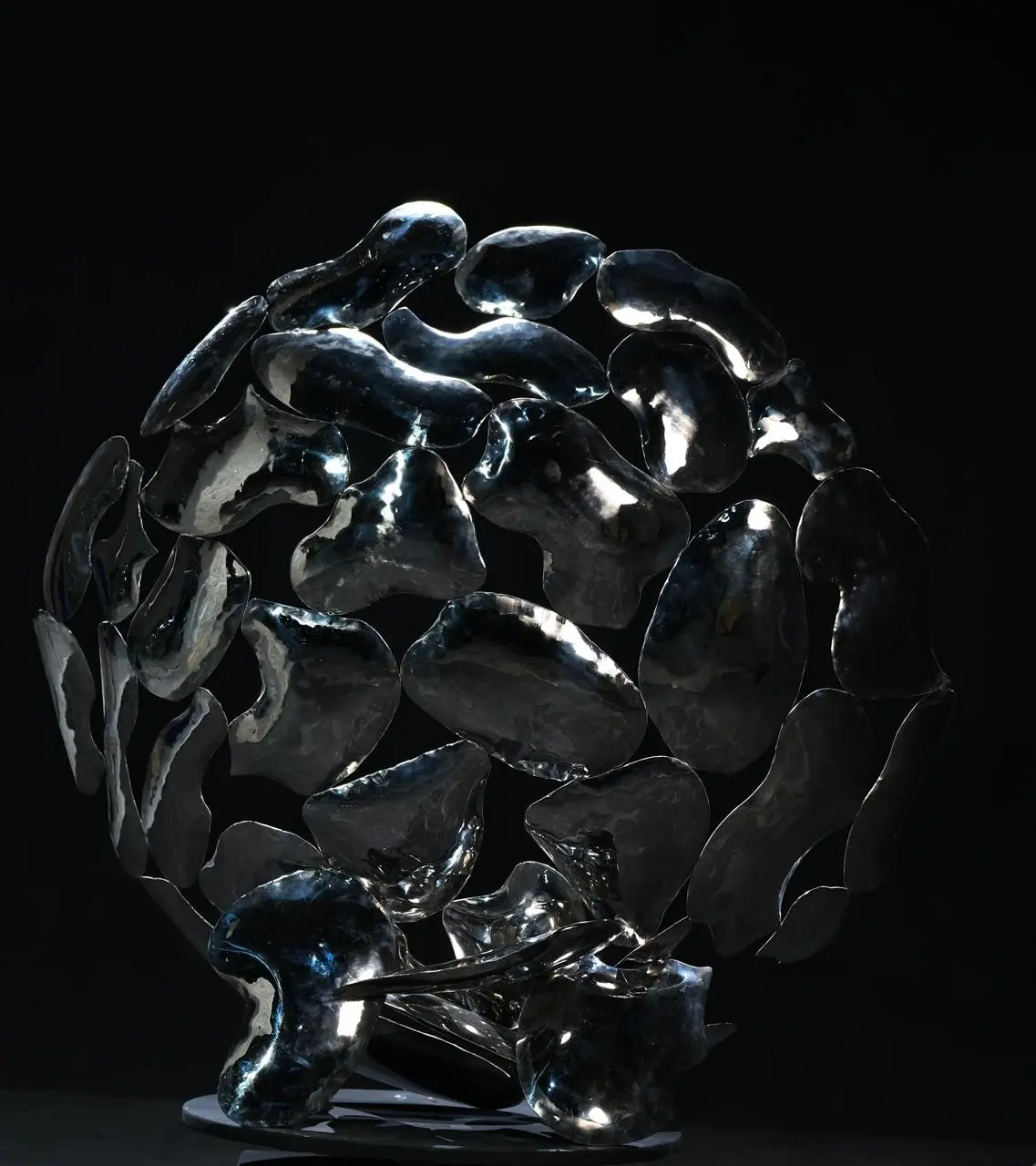 Woven stainless-steel sphere sculpture